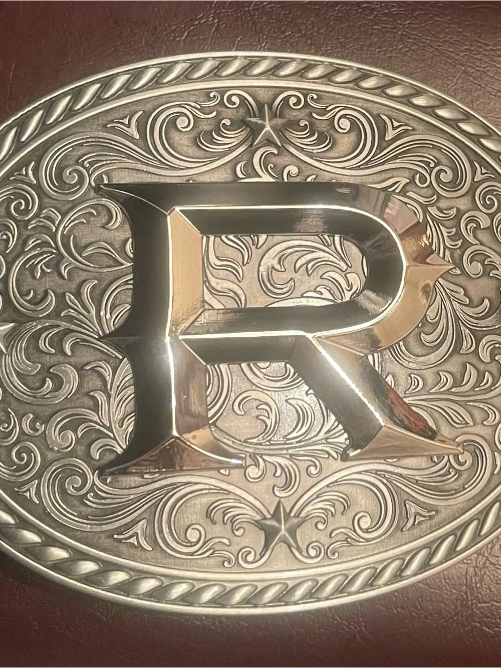 New men/women. Silvertone “T” Belt Buckle-Western Statement. Raised design.NIP